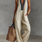Roxane | Sleeveless jumpsuit with minimalist high neck and zip closure