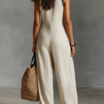 Roxane | Sleeveless jumpsuit with minimalist high neck and zip closure