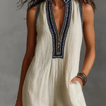 Roxane | Sleeveless jumpsuit with minimalist high neck and zip closure