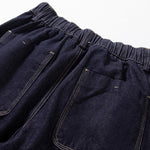Scimitar-cut Denim Carrot Pants