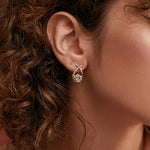 Soledad - Earrings with gold cross and zircon