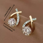 Soledad - Earrings with gold cross and zircon