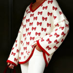 Zeagoo All-Over Bow Tie Pattern Knit Sweater