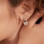 Soledad - Earrings with gold cross and zircon