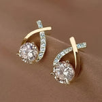 Soledad - Earrings with gold cross and zircon