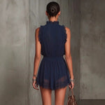 Camille | Pleated chiffon playsuit with lace details and ruffled trim